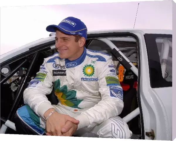 World Rally Championship: Leg 1 rally leader Francois Duval sits in the doorway of his Ford Focus WRC