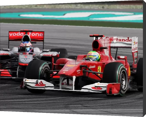Formula One World Championship: Felipe Massa Ferrari F10 and Jenson Button McLaren MP4  /  25 battle for position