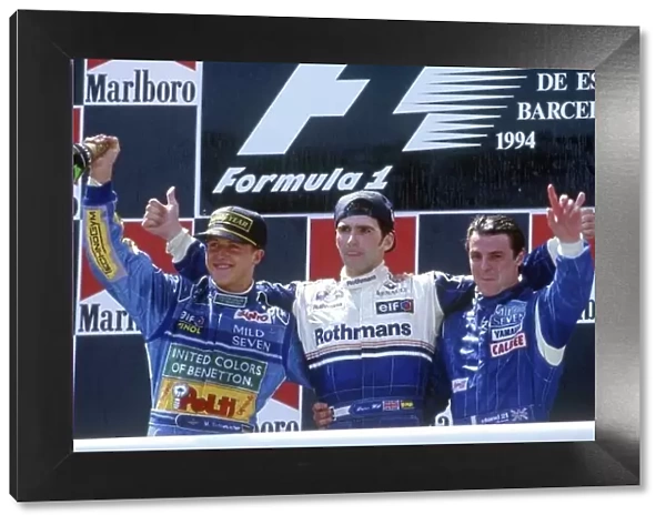1994 Spanish Grand Prix. Catalunya, Barcelona, Spain. 27th - 29th May 1994. Damon Hill (Williams FW16 Renault) 1st position salutes the crowd with Michael Schumacher (Benetton B194 Ford) 2nd position and Mark Blundell (Tyrrell Yamaha 022)