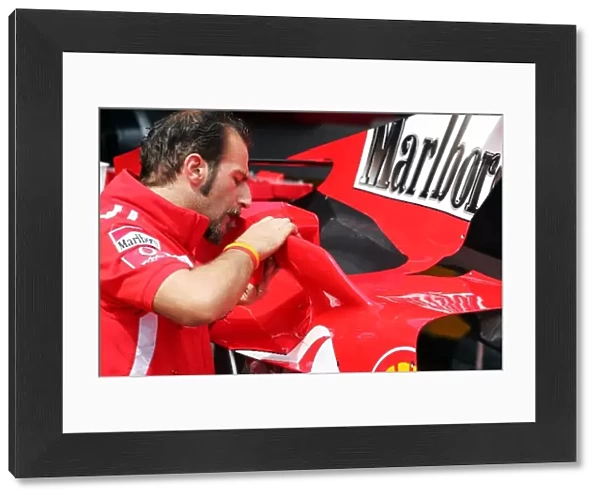 Formula One World Championship: Ferrari mechanic adds winglets to the Ferrari F2005