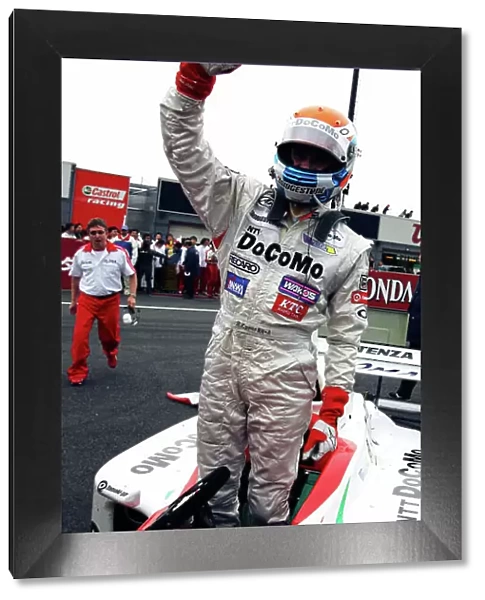 2005 Formula Nippon Championship Motegi, Japan. 3rd April 2005 Race winner Ricahard Lyons (1st), DoCoMo Dandelion. Celebrates. World Copyright: Yasushi Ishihara / LAT Photographic ref: Digital Image Only