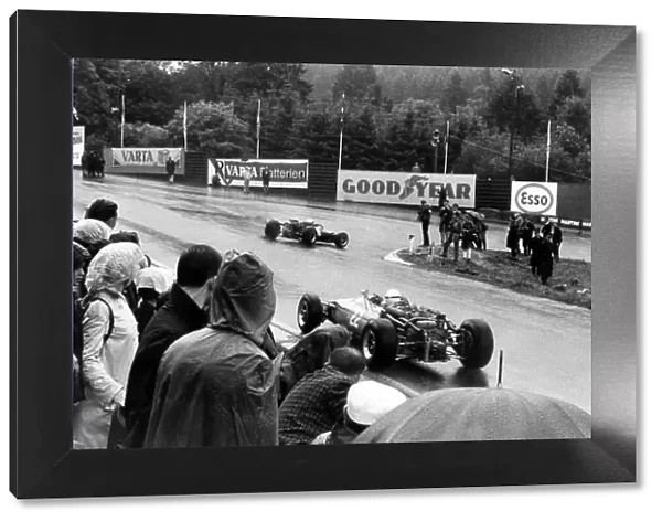 1966 Belgian Grand Prix. Spa-Francorchamps, Belgium. 12 June 1966. Richie Ginther, Cooper T81-Maserati, 5th position, leads Guy Ligier, Cooper T81-Maserati, not classified, action. World Copyright: LAT Photographic Ref: Motor b&w print