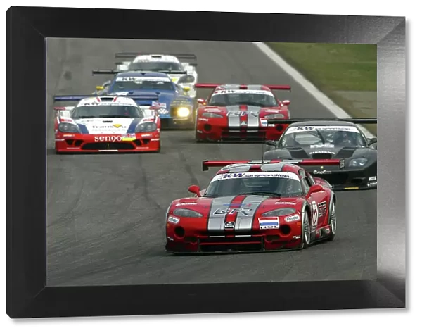 2004 FIA GT Championship Monza, Italy. 25th - 27th March. The Chrysler Viper GTS-R of Zwaan, Bouchut and Goossens leads the pack. Action. World Copyright: Photo4 / LAT Photographic ref: Digital Image Only