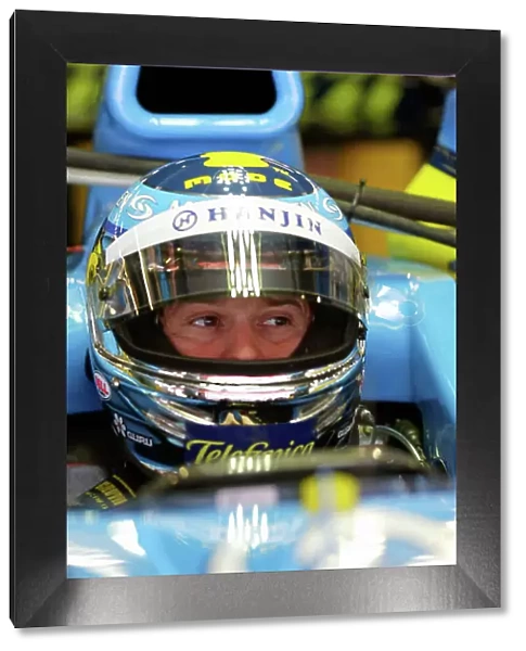 2004 Spanish Grand Prix - Friday Circuit de Catalunya, Barcelona, Spain. 7th - 9th May. Jarno Trulli, Renault R24 sits in the car. Portrait. World Copyright: Charles Coates / LAT Photographic ref: Digital Image Only