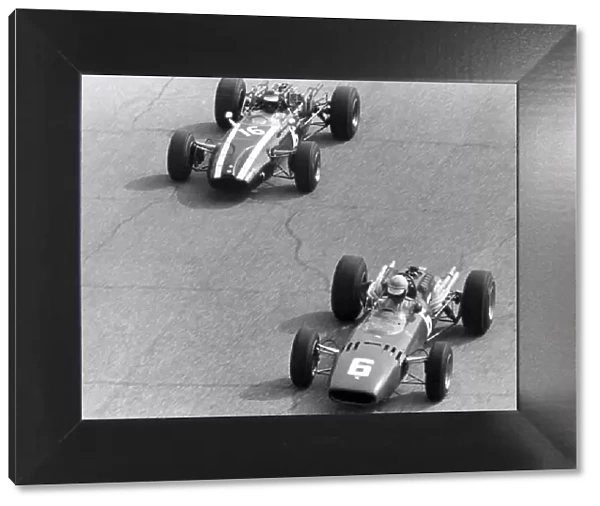 1966 Italian Grand Prix. Monza, Italy. 4 September 1966. Ludovico Scarfiotti, Ferrari 312, 1st position, leads Jochen Rindt, Cooper T81-Maserati, 4th position, action. World Copyright: LAT Photographic Ref: Motor b&w print