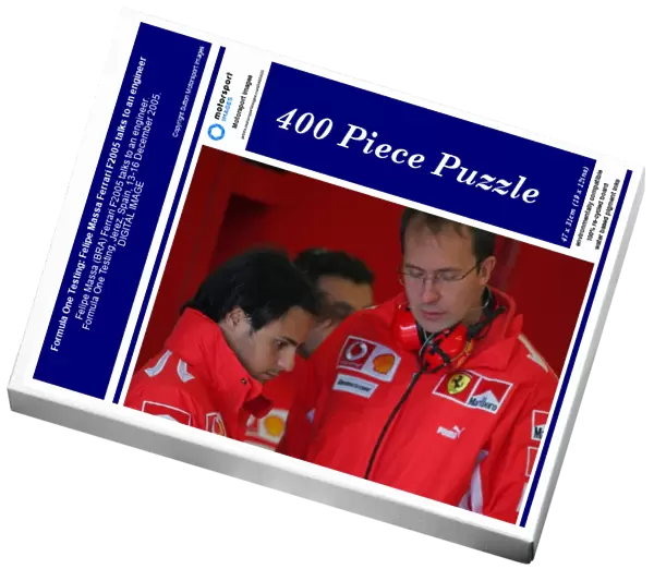 Formula One Testing: Felipe Massa Ferrari F2005 talks to an engineer