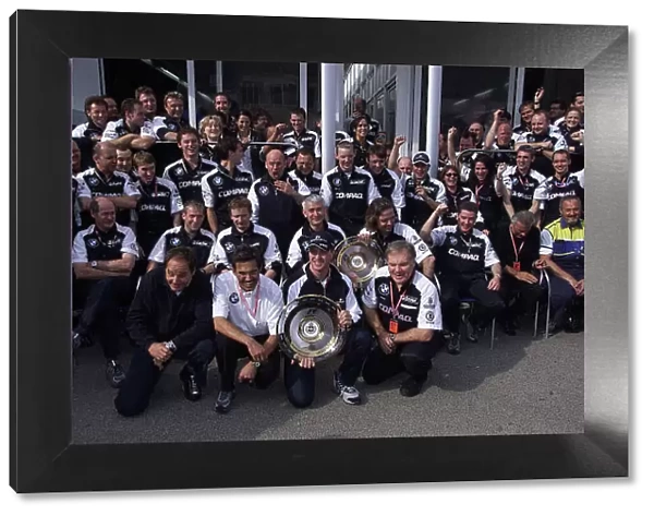 2001 San Marino Grand Prix - Race Imola, Italy. 15th April 2001. Ralf Schumacher, BMW Williams celebrates with the team after taking his first ever rave win and the first victory for BMW power with the BMW team. World Copyright