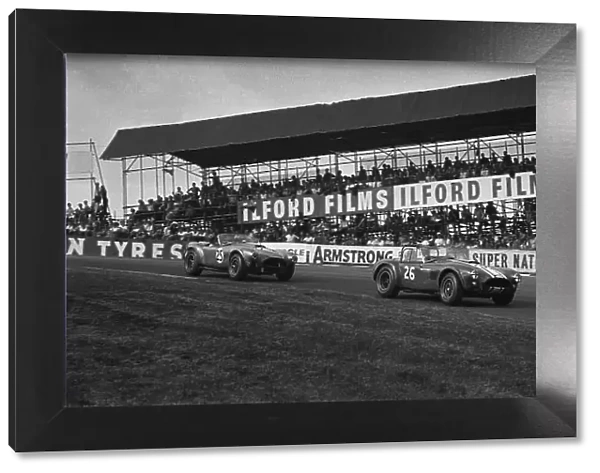 1964 Guards International Trophy. Brands Hatch, England. 3rd August 1964. Jack Sears (Shelby Cobra), 5th position leads Chris Amon (Shelby Cobra), 6th position, action. World Copyright: LAT Photographic. Ref: 899 - 2