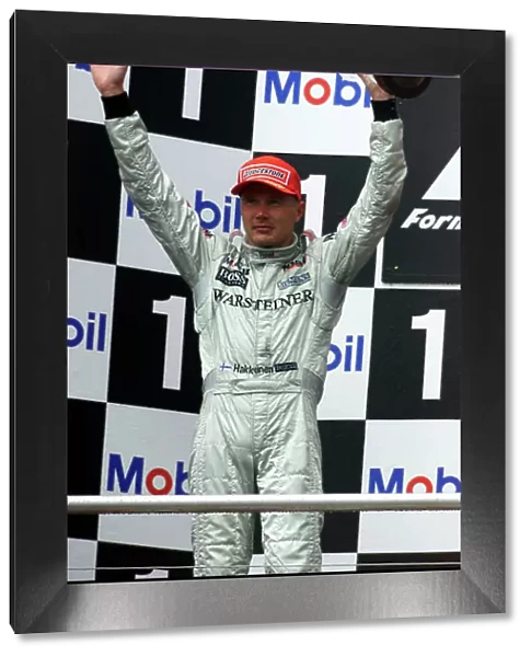 2000 German Grand Prix Hockenheim, Germany, 27th - 30th July 2000. Mika Hakkinen, McLaren Mercedes celebrates a second place finish. World Coates /  LAT Photographic ref: 5 mb Digital: Race