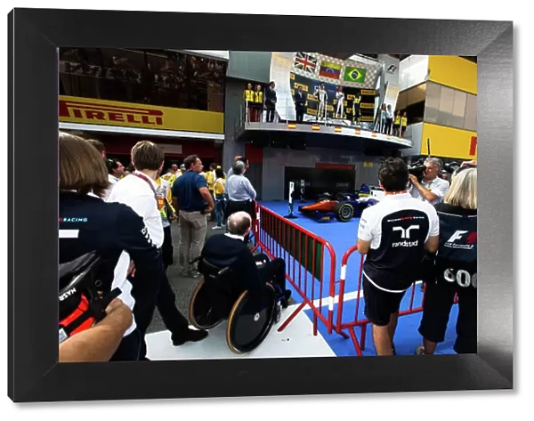 2014 GP2 Series Round 2 - Race 1. Circuit de Catalunya, Barcelona, Spain. Saturday 10 May 2014. Frank Williams watch the GP2 podium Photo: Malcolm Griffiths / GP2 Series Media Service. ref: Digital Image F80P2179