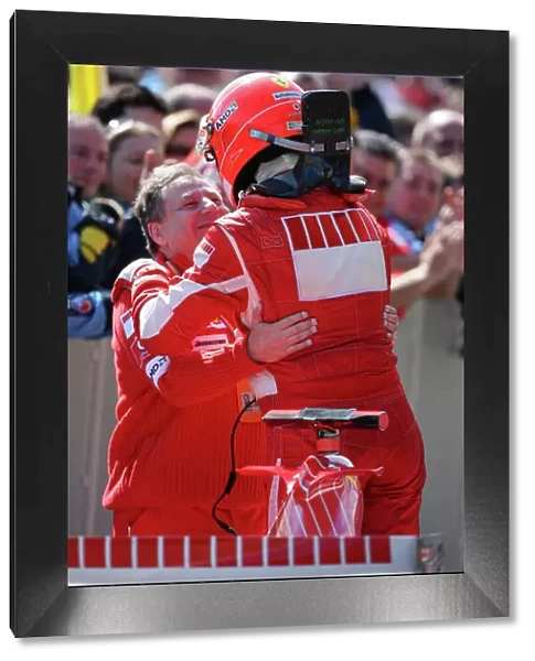 2006 San Marino Grand Prix - Sunday Race, Imola, Italy. Michael Schumacher, Ferrari 248F1, is congratulated by team boss, Jean Todt, 1st position, portrait