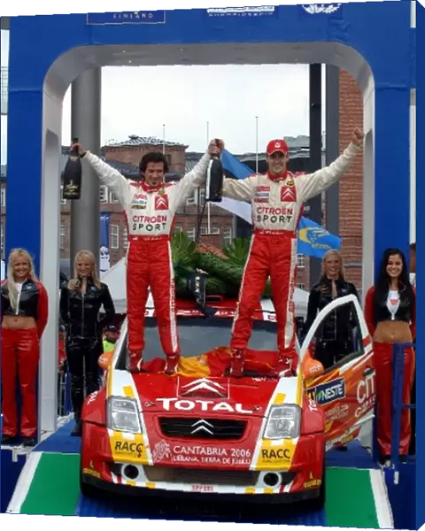 FIA World Rally Championship: Daniel Sordo and Marc Marti, Citroen C2 Super 1600, celebrate their win on the podium