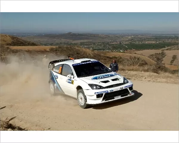 FIA World Rally Championship: Antony Warmbold, Ford Focus RS WRC, on stage 13