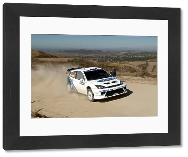 FIA World Rally Championship: Antony Warmbold, Ford Focus RS WRC, on stage 13