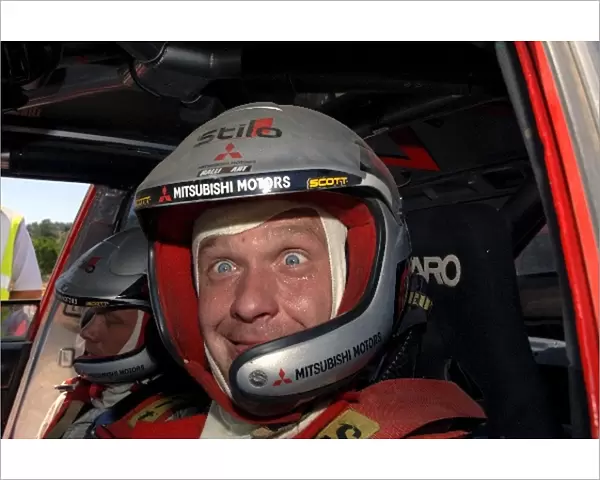 FIA World Rally Championship: Harri Rovanpera, Mitsubishi, pulls a face at the end of the final stage. He finished seventh
