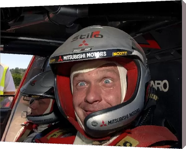 FIA World Rally Championship: Harri Rovanpera, Mitsubishi, pulls a face at the end of the final stage. He finished seventh