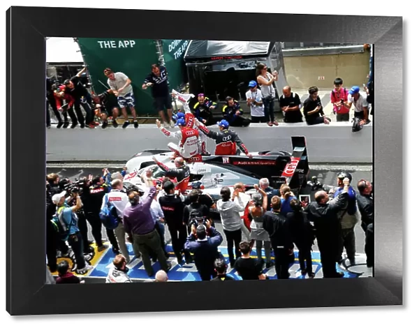 2014 Le Mans 24 Hours. Circuit de la Sarthe, Le Mans, France. Sunday 15 June 2014. The Audis make there way to the winners podium. World Copyright:Adam Warner / LAT Photographic. ref: Digital Image _L5R3156