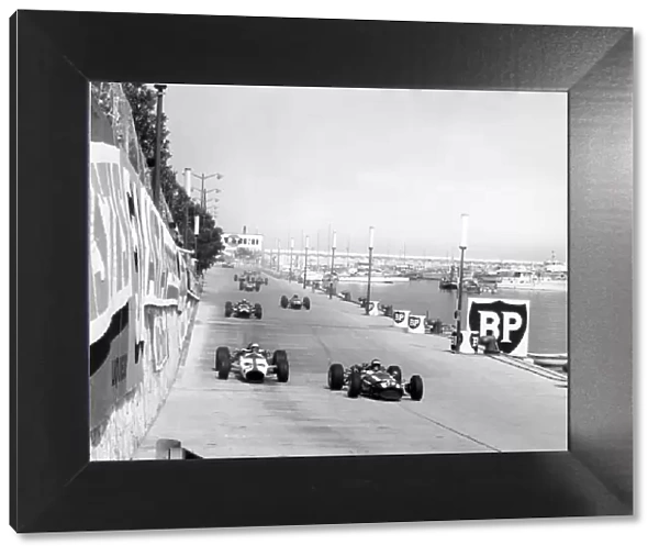 1966 Monaco Grand Prix. Monte Carlo, Monaco. 22 May 1966. Jochen Rindt, Cooper T81-Maserati, retired, leads Bruce McLaren, McLaren M2B-Ford, retired, Richie Ginther, Cooper T81-Maserati, retired, Lorenzo Bandini, Ferrari 158 / 246, 2nd position