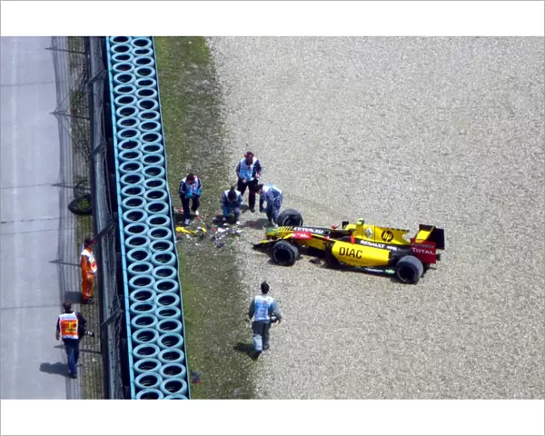 Formula One World Championship: Vitaly Petrov Renault R30 crashed at the final corner in the third practice session