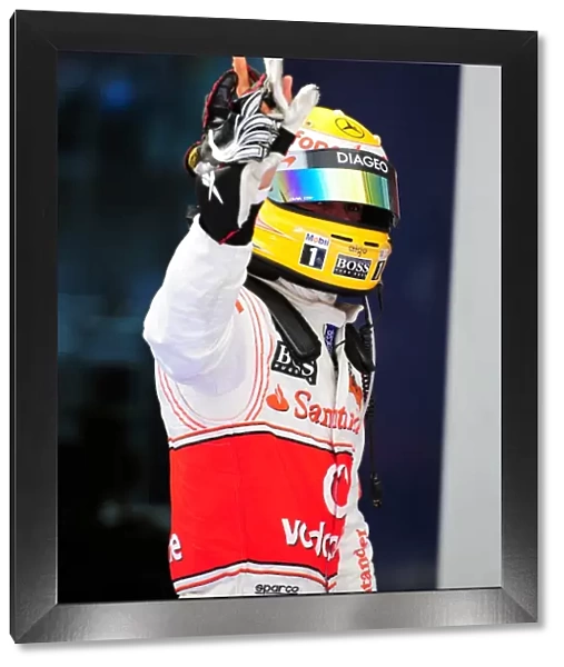 Formula One World Championship: Race winner Lewis Hamilton McLaren celebrates in parc ferme