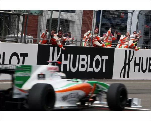 Formula One World Championship: Adrian Sutil Force India F1 VJM03 passes his team at the end of the race