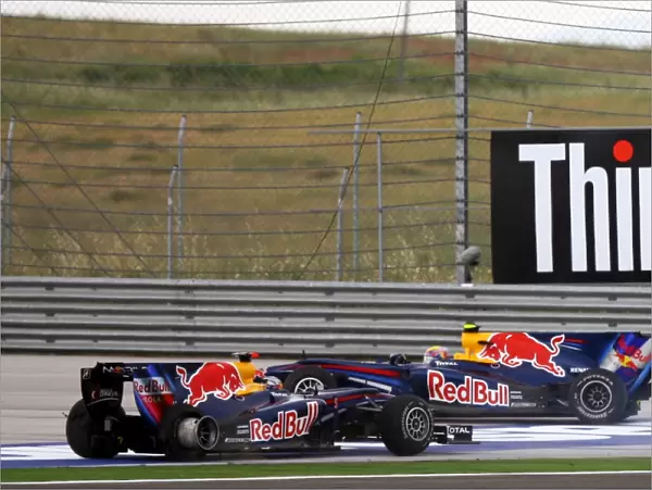 Formula One World Championship: Sebastian Vettel Red Bull Racing RB6 and team mate Mark Webber Red Bull Racing RB6 after the two collided in