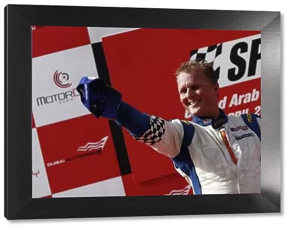 2008 Speedcar Series Round 5. Dubai. Dubai Autodrome. 11-12th April. Johnny Herbert Speedcar Champion on the podium. World Copyright: Andrew Ferraro / LAT Photographic ref: _H0Y7824.jpg