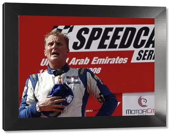 2008 Speedcar Series Round 5. Dubai. Dubai Autodrome. 11-12th April. Johnny Herbert Speedcar Champion on the podium. World Copyright: Andrew Ferraro / LAT Photographic ref: _H0Y7816.jpg