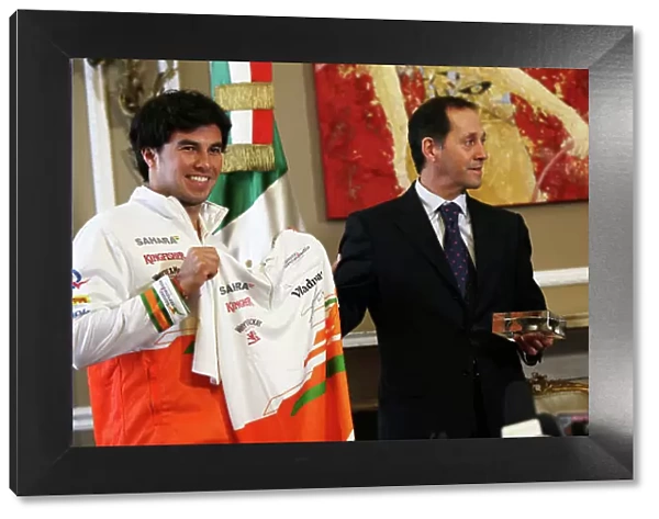 Force India F1 Driver Announcement Belgrave Square, London 12th December 2013 Sergio Perez in his new team clothing. World Copyright: Sam Bloxham / LAT Photographic ref: Digital Image IMG_6525