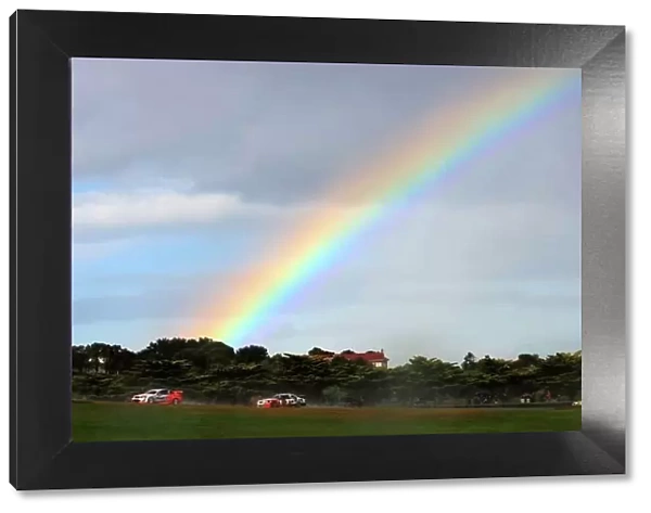 08av810. Glenn Seton (aust) Toll HRT Commodore, runs under the rainbow