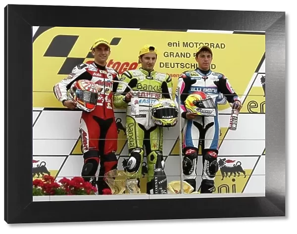MotoGP. 125cc podium and results:. 1st Hector Faubel 