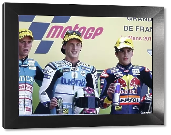 MotoGP. 125cc podium and results:. 1st Pol Espargaro (ESP), Tuenti Racing, centre.