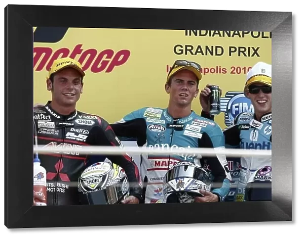 MotoGP. 125cc podium and results:. 1st: Nicolas Terol (ESP), centre.