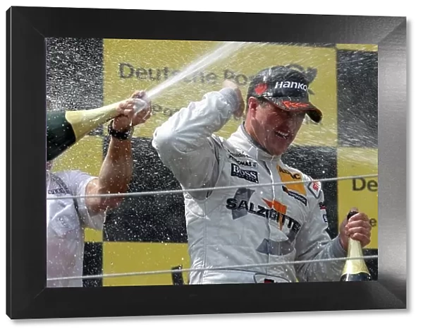 DTM. Ralf Schumacher (GER), Salzgitter AMG Mercedes (2nd) celebrates on the podium.