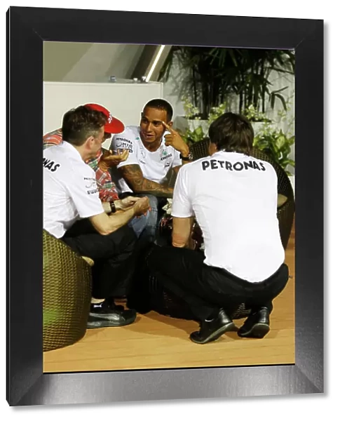 Marina Bay Circuit, Singapore. Friday 20th September 2013. Lewis Hamilton, Mercedes AMG in conversation with Niki Lauda, Non-Executive Chairman, Mercedes AMG, Toto Wolff, Executive Director, Mercedes AMG and Paddy Lowe
