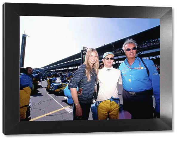 2002 United States Grand Prix Indianapolis, America. 27th - 29th eptember 2002. Jarno Trulli, Renault R202, with Flavio Briatore and German Supermodel XX