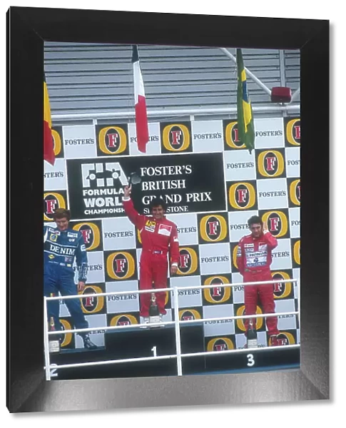 1990 British Grand Prix. Silverstone, England. 13-15 July 1990. Alain Prost (Ferrari) celebrates his 1st position with Thierry Boutsen (Williams Renault) 2nd position and Ayrton Senna (McLaren Honda)