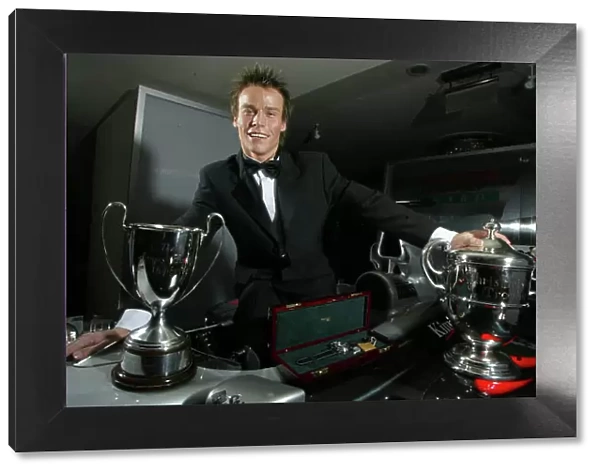 2003 AUTOSPORT AWARDS, The Grosvenor, London. 7th December 2003. McLaren Autosport Young driver, Alex Lloyd shows off his prizes. Photo: Peter Spinney / LAT Photographic Ref: Digital Image only