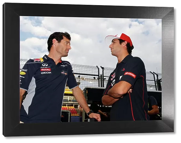 Marina Bay Circuit, Singapore. 19th September 2013. Mark Webber, Red Bull Racing, talks to Daniel Ricciardo, Toro Rosso. World Copyright: Steven Tee / LAT Photographic. ref: Digital Image _L0U0513