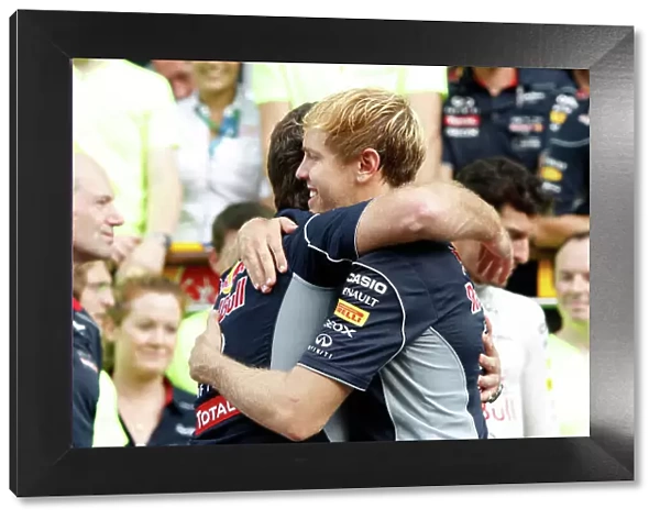 Autodromo Nazionale di Monza, Monza, Italy. 8th September 2013. Sebastian Vettel, Red Bull Racing. 1st position, is congratulated by Christian Horner, Team Principal