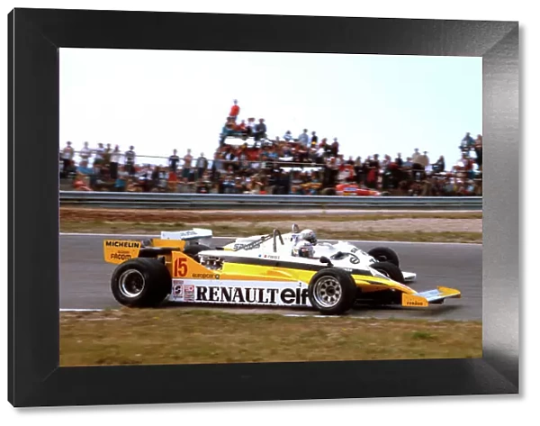 1981 Dutch Grand Prix. Zandvoort, Holland. 28-30 August 1981. Alain Prost (Renault RE30) battles with Alan Jones (Williams FW07C Ford). Ref-81 HOL 11. World Copyright - LAT Photographic