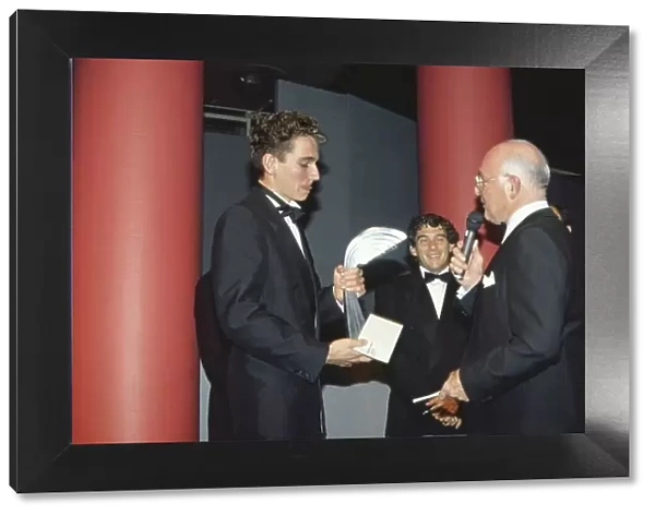 1991 Autosport Awards. Grosvenor House Hotel, Park Lane, London. Ayrton Senna presents Oliver Gavin with the Autosport Young Driver of the Year Award as Murray Walker interviews him. World - LAT Photographic