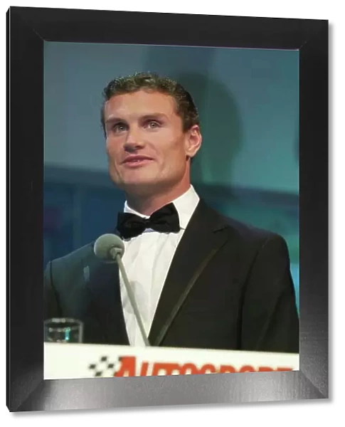 2003 AUTOSPORT AWARDS, The Grosvenor, London. 7th December 2003. David Coulthard receives a Gold award from the BRDC. Photo: Peter Spinney / LAT Photographic Ref: Digital Image only