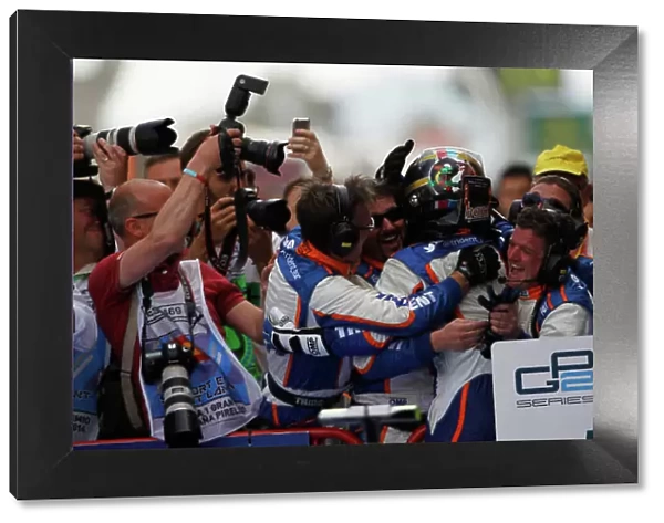 2014 GP2 Series Round 2 - Race 1. Circuit de Catalunya, Barcelona, Spain. Saturday 10 May 2014. Johnny Cecotto (VEN, Trident) celebrates his win with his team Photo: Sam Bloxham / GP2 Series Media Service. ref: Digital Image _G7C6870