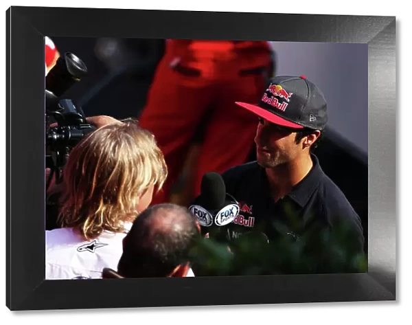 Autodromo Nazionale di Monza, Monza, Italy. 5th September 2013. Daniel Ricciardo, Toro Rosso, is interviewed. World Copyright: Andy Hone / LAT Photographic. ref: Digital Image HONZ5814