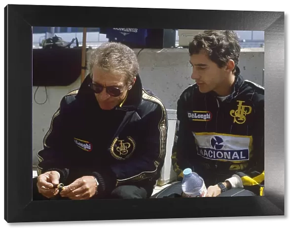 1986 Spanish Grand Prix. Jerez, Spain. 11th - 13th April 1986. Ayrton Senna (Lotus 98T-Renault), 1st position, talks with Gerard Ducarouge, portrait. World Copyright: LAT Photographic. Ref: 86ESPb