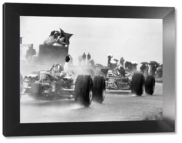 1968 Dutch Grand Prix. Zandvoort, Holland. 23 June 1968. Blue flags are show as Richard Attwood, BRM P126, 7th position, prepares to pass Jo Siffert, Lotus 49-Ford, retired, action. World Copyright: LAT Photographic Ref: Motor b&w print