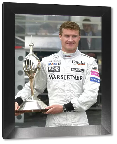 2004 British Grand Prix-Sunday Race, Silverstone, England. 11th July 2004. David Coulthard, McLaren Mercedes MP4 / 19, portrait. World Copyright LAT Photographic. Digital Image only (a high res version is available on request)