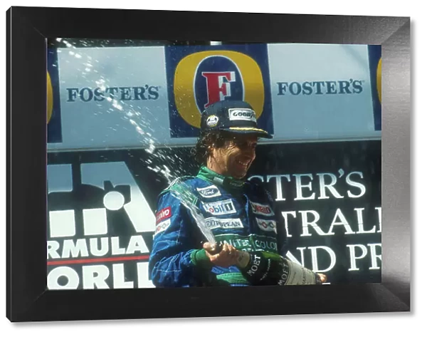 1990 Australian Grand Prix. Adelaide, Australia. 2-4 November 1990. Nelson Piquet (Benetton Ford) celebrates 1st position on the podium. Ref-90 AUS 04. World Copyright - LAT Photographic
