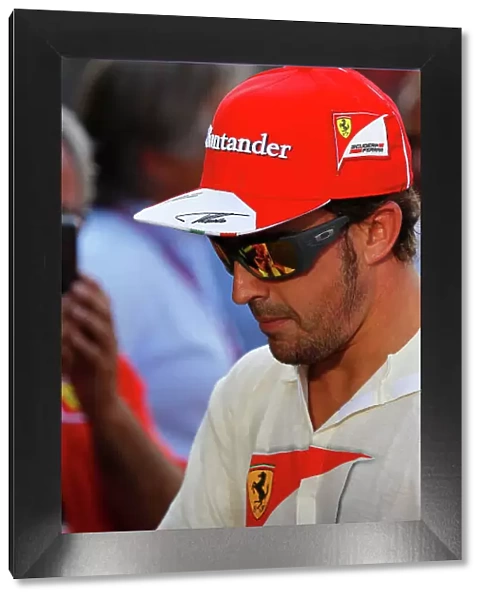Autodromo Nazionale di Monza, Monza, Italy. Fernando Alonso, Ferrari, signs autographs in the paddock 7th September 2013. World Copyright: Sam Bloxham / LAT Photographic. ref: Digital Image _LOX9939